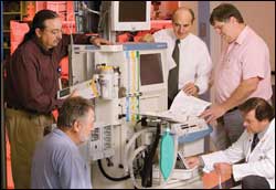 Curtis A. Blair, research nurse; John Klasen, manager; Yadin David, director, biomedical engineering; Ronald Robb, manager; and John Weimert, assistant director.